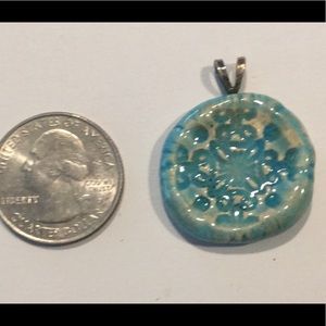 Aromatherapy clay fired pendant